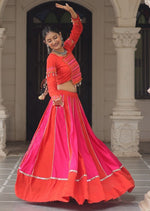 Magnetic Orange Color Silk Fabric Party Wear Lehenga