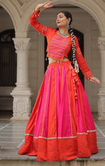 Magnetic Orange Color Silk Fabric Party Wear Lehenga