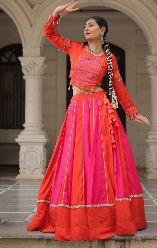 Magnetic Orange Color Silk Fabric Party Wear Lehenga