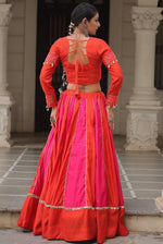 Magnetic Orange Color Silk Fabric Party Wear Lehenga