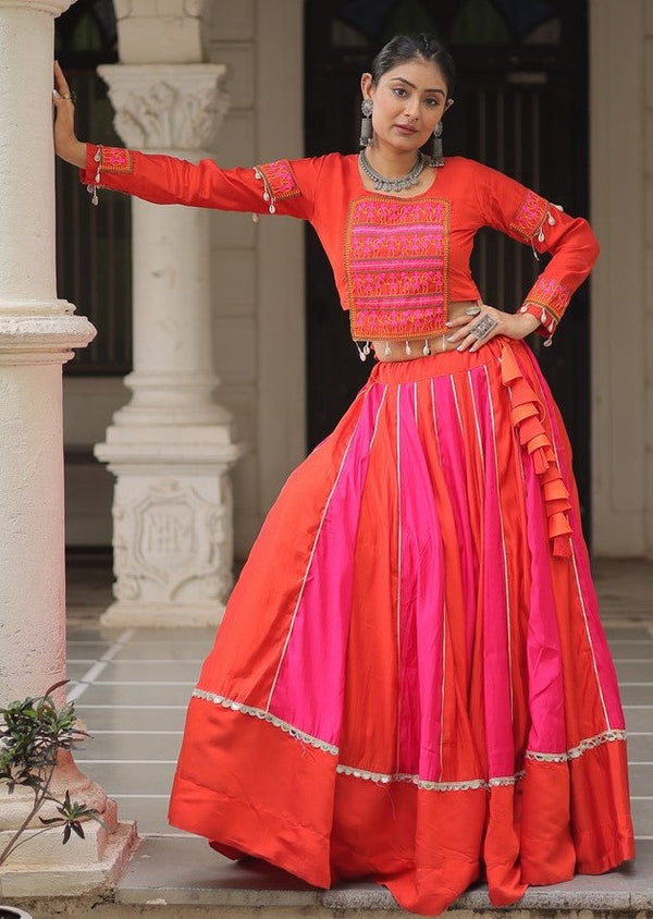 Magnetic Orange Color Silk Fabric Party Wear Lehenga