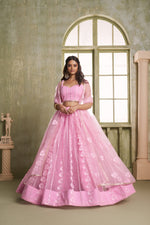 Magnetic Pink Color Net Fabric Party Wear Lehenga