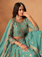 Amazing Turquoise Color Organza Fabric Party Wear Lehenga