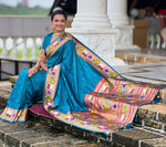 Lovely Turquoise Color Silk Fabric Partywear Saree