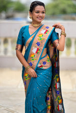 Lovely Turquoise Color Silk Fabric Partywear Saree