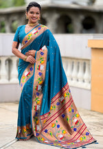 Lovely Turquoise Color Silk Fabric Partywear Saree