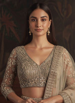 Dazzling Golden Color Net Fabric Wedding Lehenga