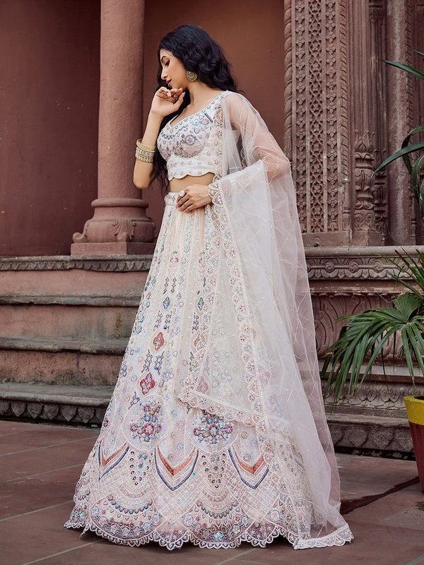 Charming Cream Color Net Fabric Party Wear Lehenga