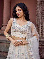 Charming Cream Color Net Fabric Party Wear Lehenga