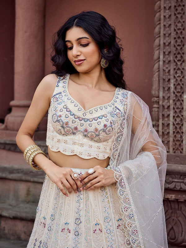 Charming Cream Color Net Fabric Party Wear Lehenga