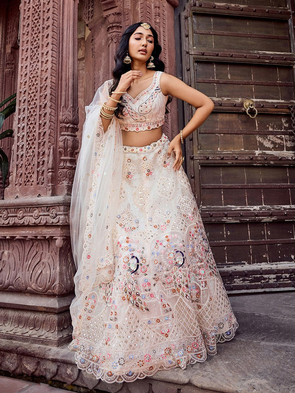 Charming Cream Color Net Fabric Party Wear Lehenga