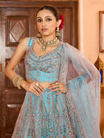 Charming Turquoise Color Net Fabric Party Wear Lehenga