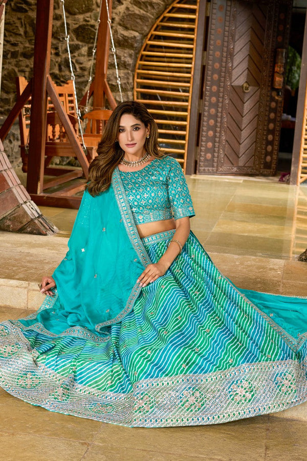 Amazing Turquoise Color Organza Fabric Party Wear Lehenga