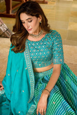 Amazing Turquoise Color Organza Fabric Party Wear Lehenga