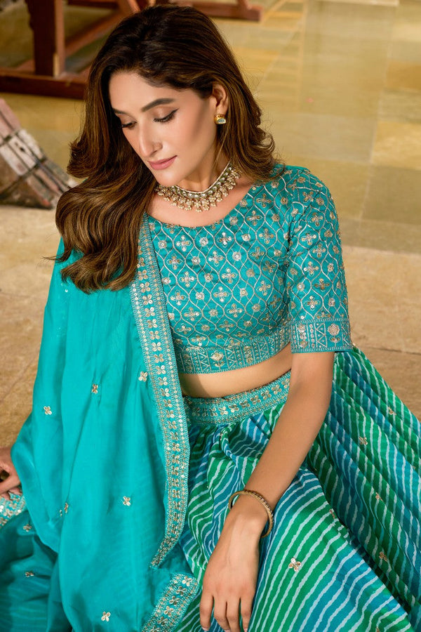 Amazing Turquoise Color Organza Fabric Party Wear Lehenga