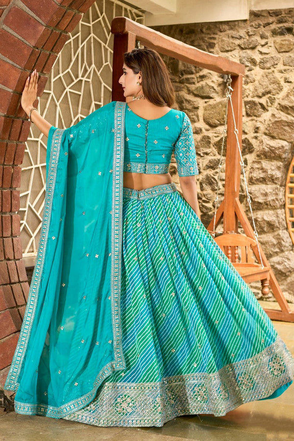 Amazing Turquoise Color Organza Fabric Party Wear Lehenga