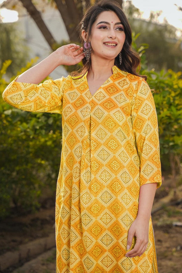 Lovely Yellow Color Rayon Fabric Casual Kurti With Bottom