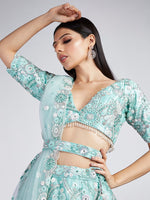 Dazzling Turquoise Color Organza Fabric Party Wear Lehenga