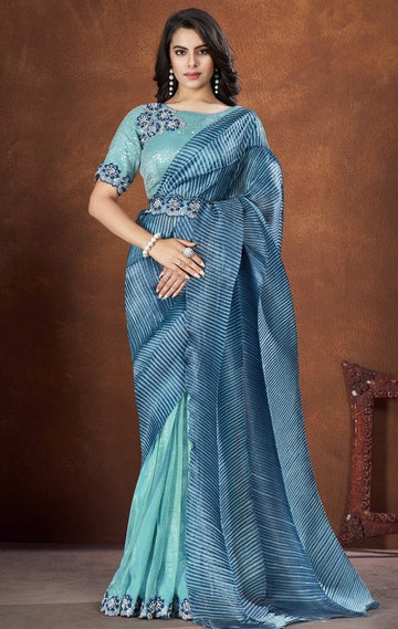 Ideal Turquoise Color Silk Fabric Partywear Saree