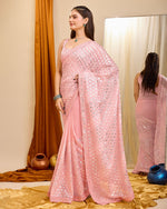 Beauteous Peach Color Georgette Fabric Partywear Saree