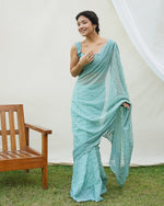 Beauteous Turquoise Color Georgette Fabric Partywear Saree