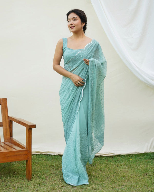 Beauteous Turquoise Color Georgette Fabric Partywear Saree