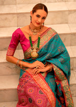 Beauteous Turquoise Color Banarasi Fabric Partywear Saree