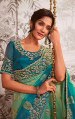 Beauteous Turquoise Color Viscose Fabric Partywear Saree