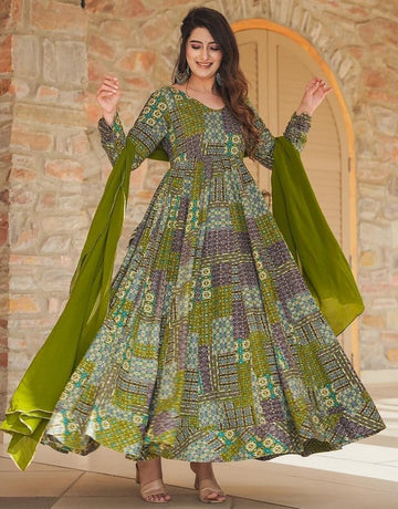 Striking Green Color Rayon Fabric Gown
