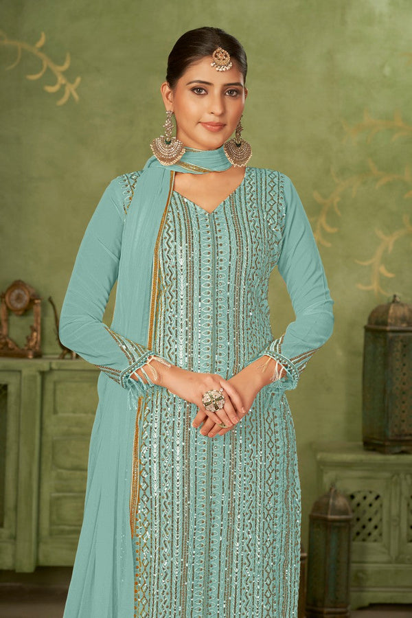 Tasteful Turquoise Color Georgette Fabric Partywear Suit