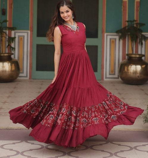 Dazzling Maroon Color Rayon Fabric Gown