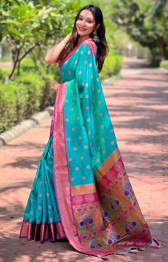 Lovely Turquoise Color Silk Fabric Partywear Saree