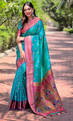 Lovely Turquoise Color Silk Fabric Partywear Saree