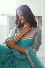 Pleasing Teal Color Net Fabric Party Wear Lehenga