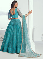 Pleasing Teal Color Net Fabric Party Wear Lehenga