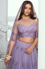 Pleasing Purple Color Net Fabric Party Wear Lehenga