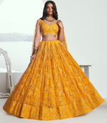 Pleasing Yellow Color Net Fabric Party Wear Lehenga