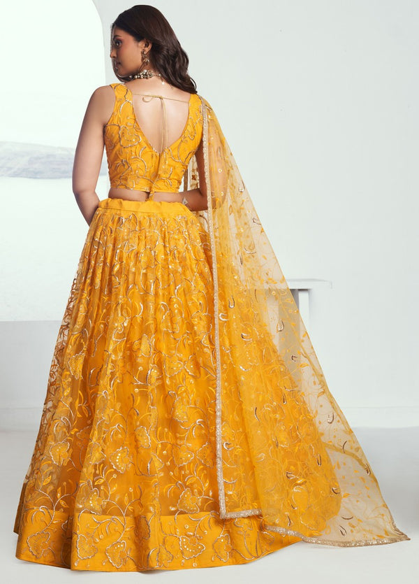 Pleasing Yellow Color Net Fabric Party Wear Lehenga