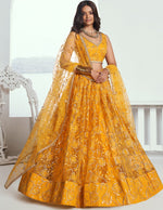 Pleasing Yellow Color Net Fabric Party Wear Lehenga