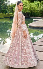 Delightful Peach Color Organza Fabric Party Wear Lehenga