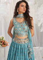 Delightful Turquoise Color Georgette Fabric Party Wear Lehenga