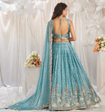 Delightful Turquoise Color Georgette Fabric Party Wear Lehenga