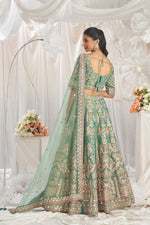 Lovely Green Color Tissue Fabric Party Wear Lehenga