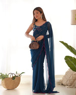 Beauteous Teal Color Georgette Fabric Partywear Sarees