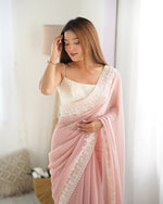 Beauteous Peach Color Georgette Fabric Casual Saree