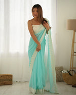 Beauteous Aqua Color Georgette Fabric Casual Saree