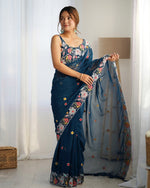 Beauteous Teal Color Georgette Fabric Partywear Saree