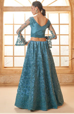 Beautiful Turquoise Color Net Fabric Party Wear Lehenga