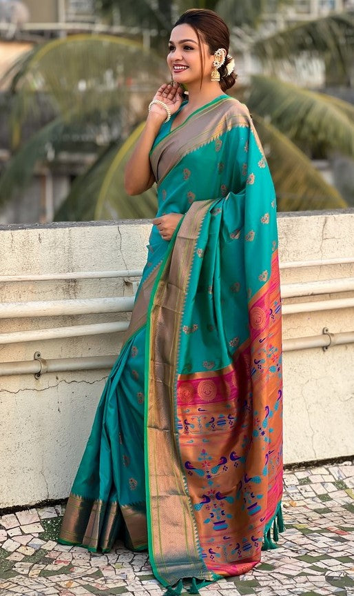 Beauteous Teal Color Silk Fabric Partywear Saree