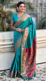 Beauteous Teal Color Silk Fabric Partywear Saree